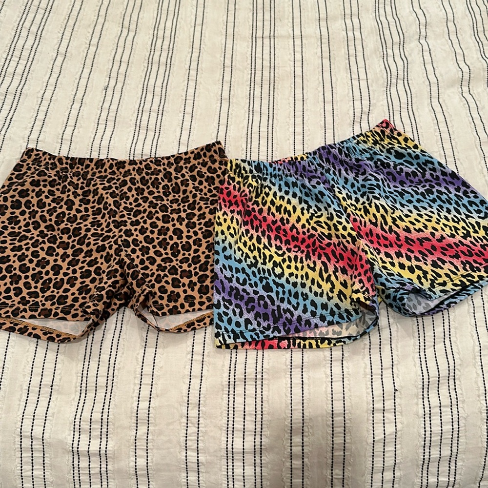 Two printed animal print biker shorts